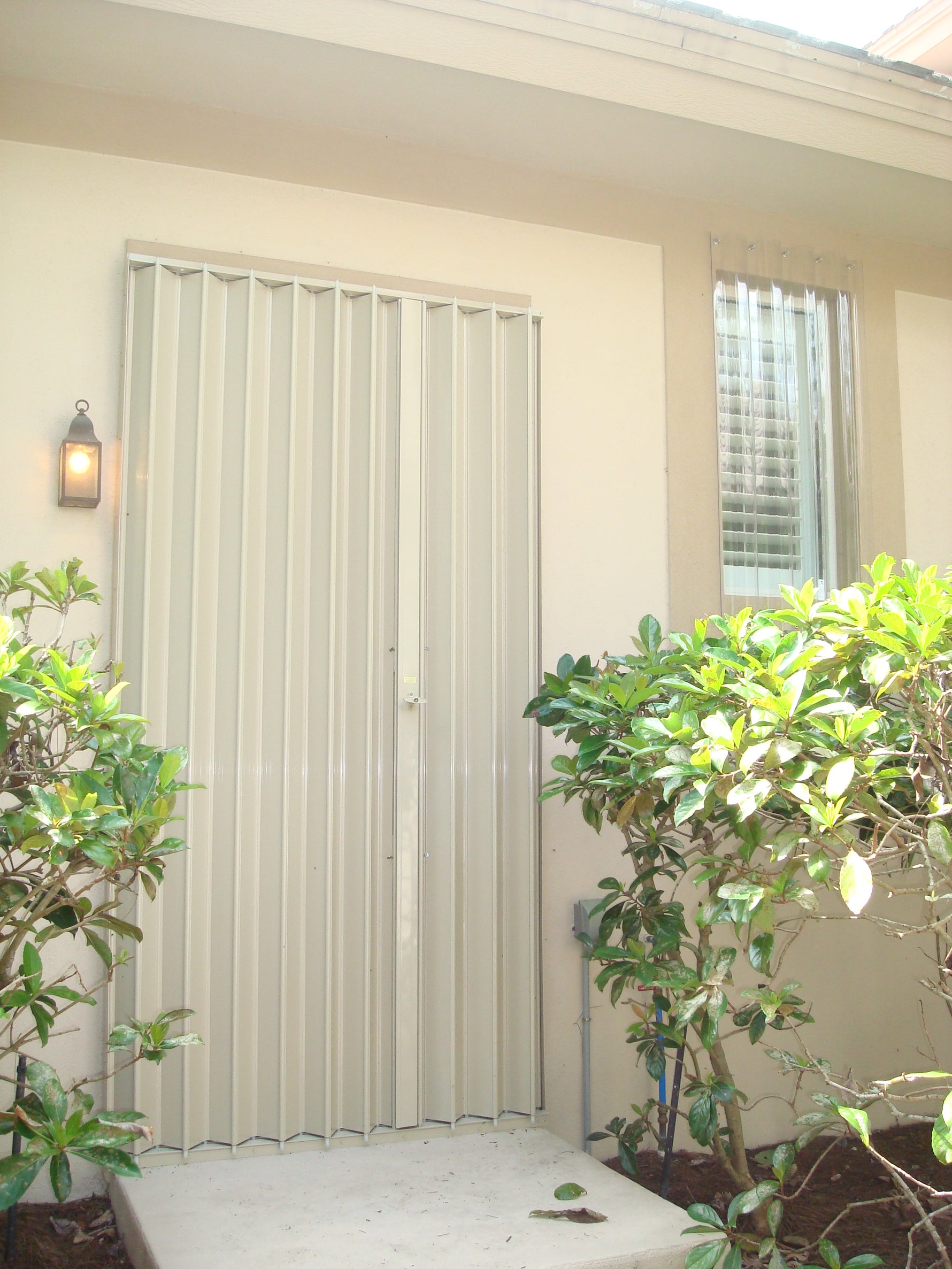 Accordion hurricane shutters by Advanced Hurricane Technology (photo 13)