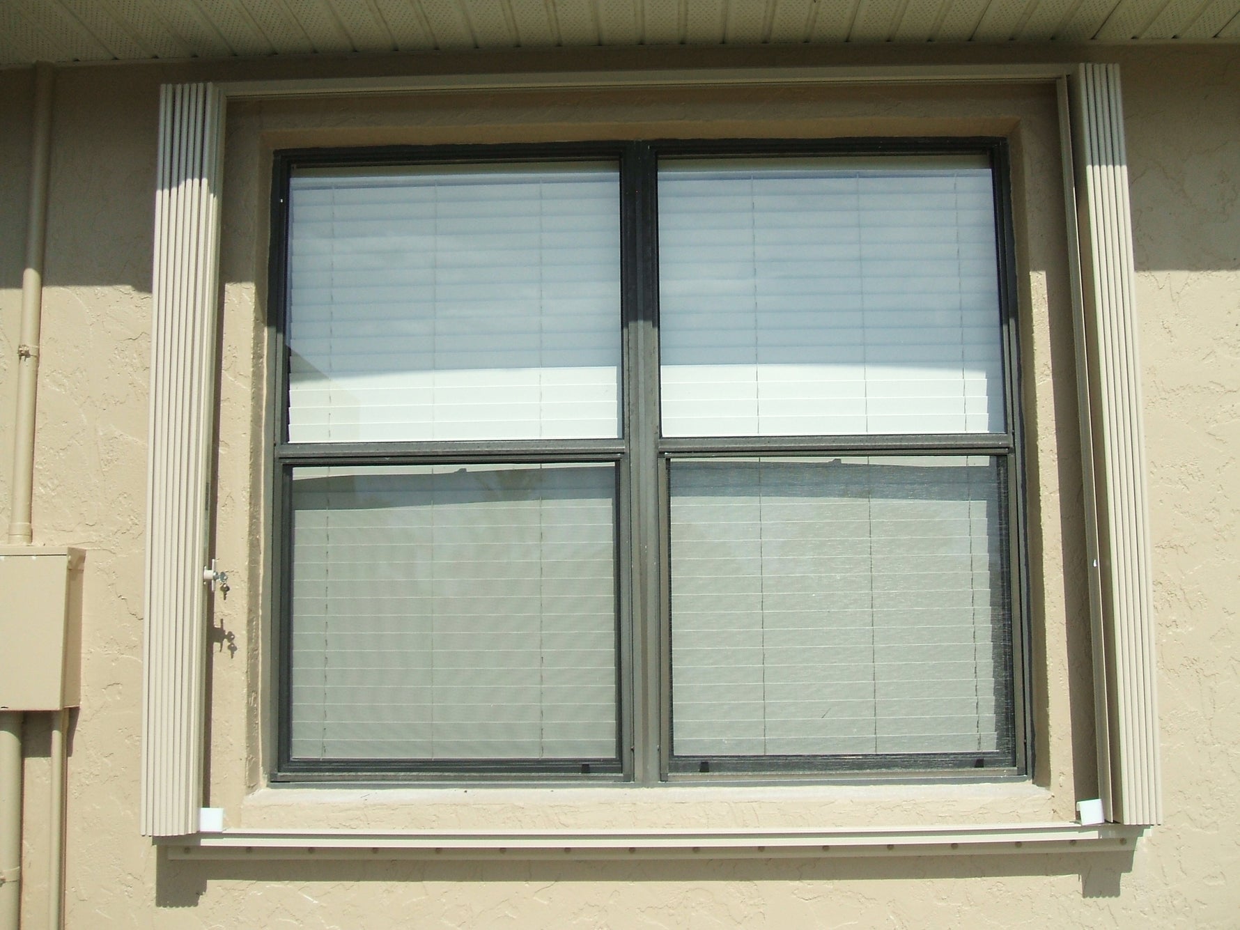 Accordion hurricane shutters by Advanced Hurricane Technology (photo 18)