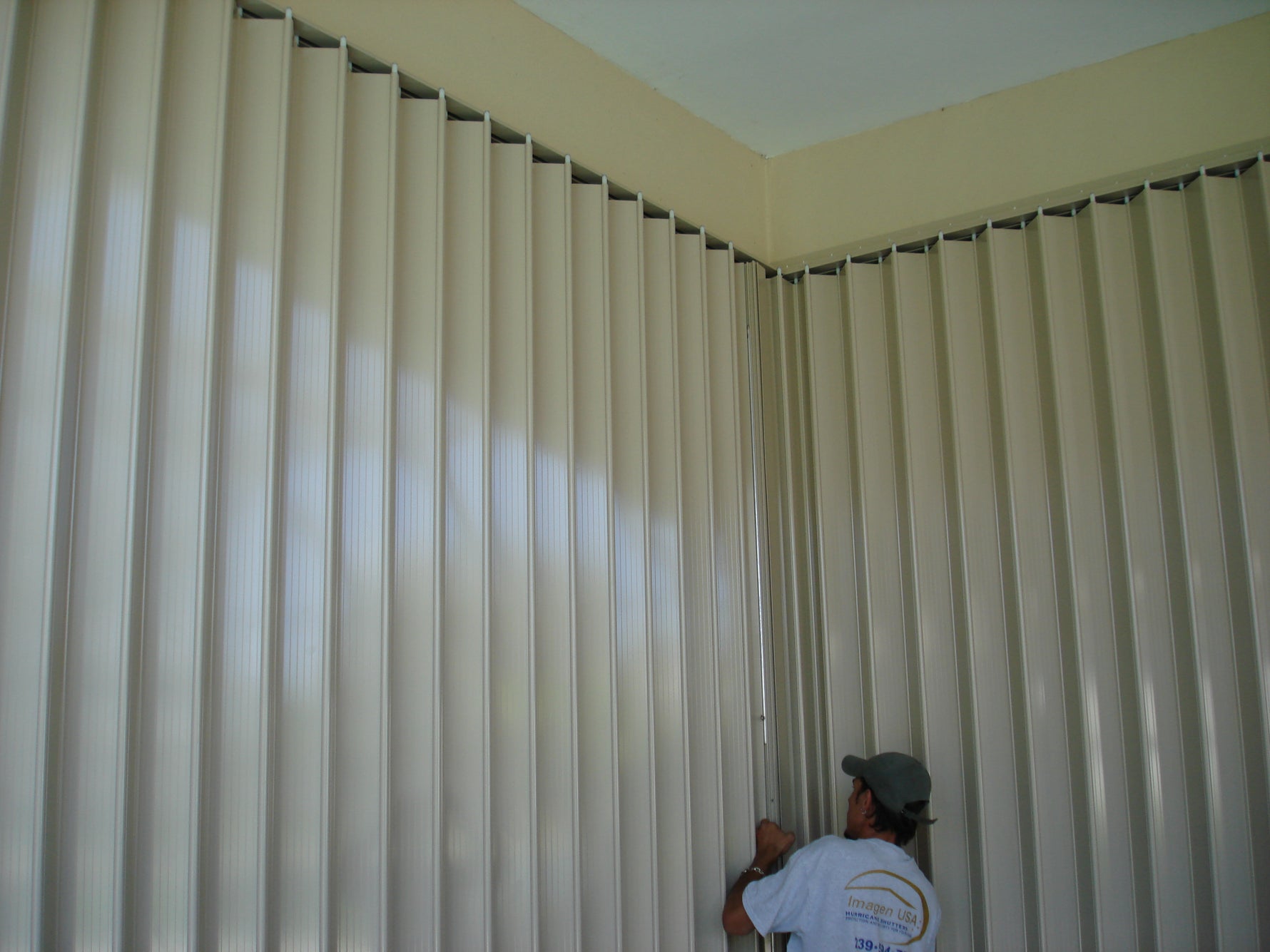 Accordion hurricane shutters by Advanced Hurricane Technology (photo 37)