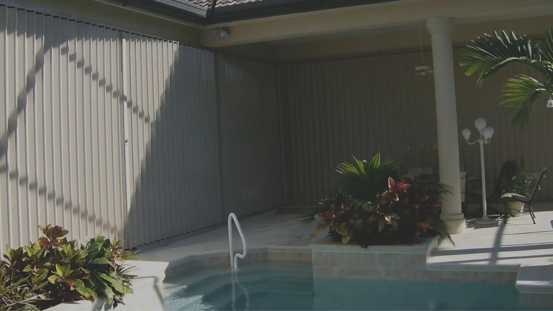 Accordion hurricane shutters by Advanced Hurricane Technology