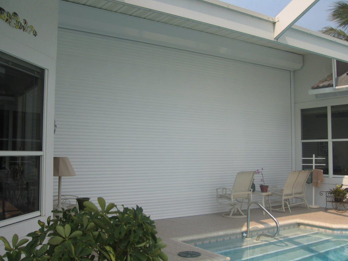 Rolldown hurricane shutters by Advanced Hurricane Technology (photo 6)