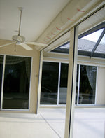 Rolldown hurricane shutters by Advanced Hurricane Technology (photo 25)